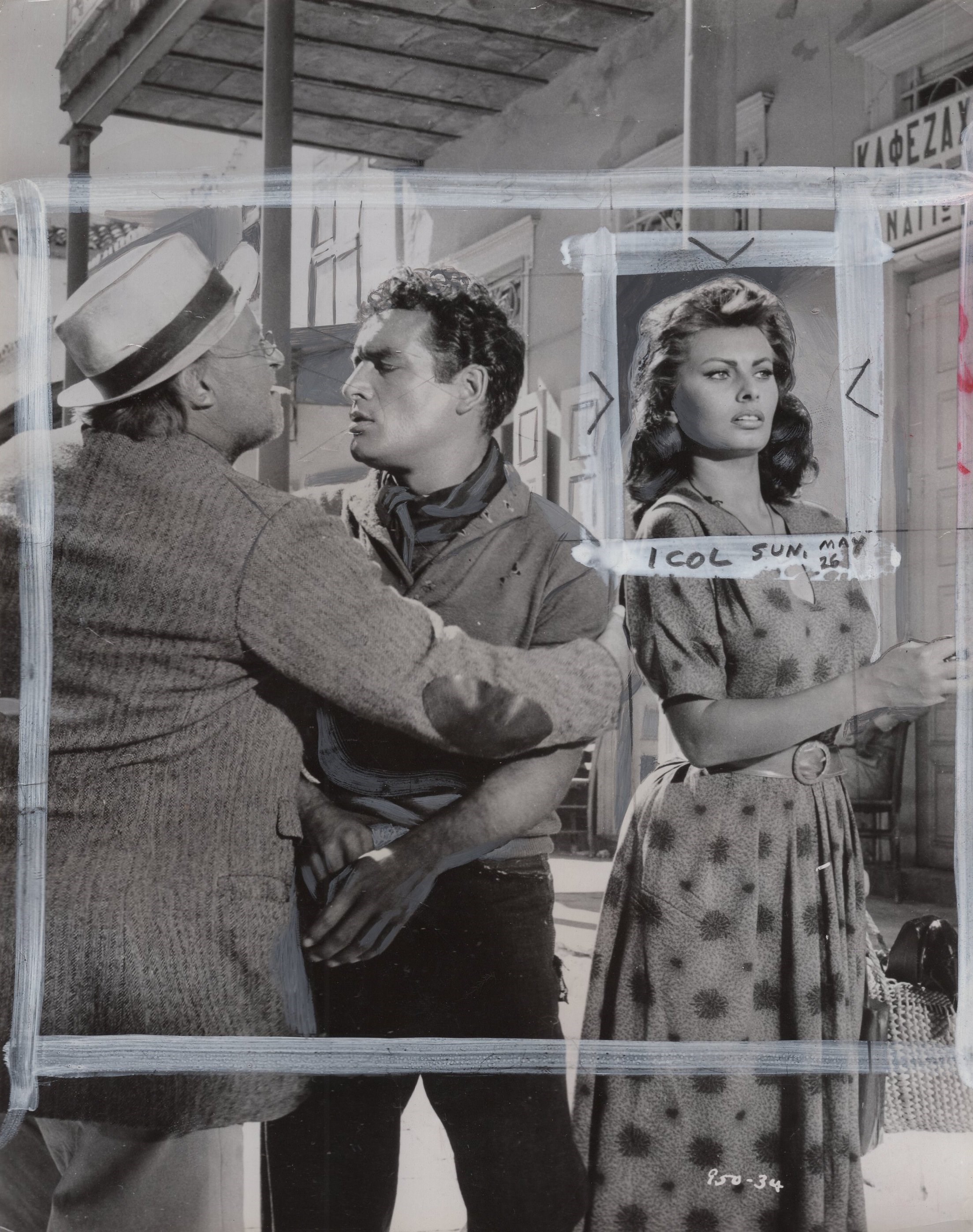 SOPHIA LOREN keeps a sharp lookout for ALAN LADD as JORGE MISTRAL and LAURENCE NAYSMITH argue over spoils on a Dolphin...